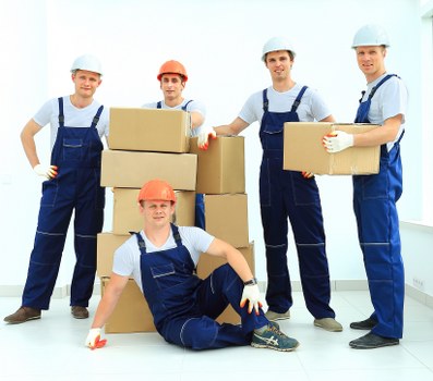 Removal team planning a move in Friernbarnet with boxes and furniture