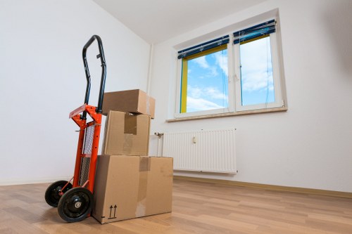Careful loading of household items for a Friern Barnet relocation