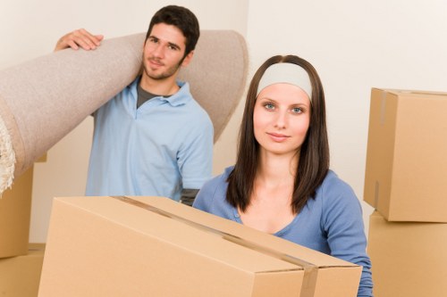 Packing and loading furniture into a moving van in north London